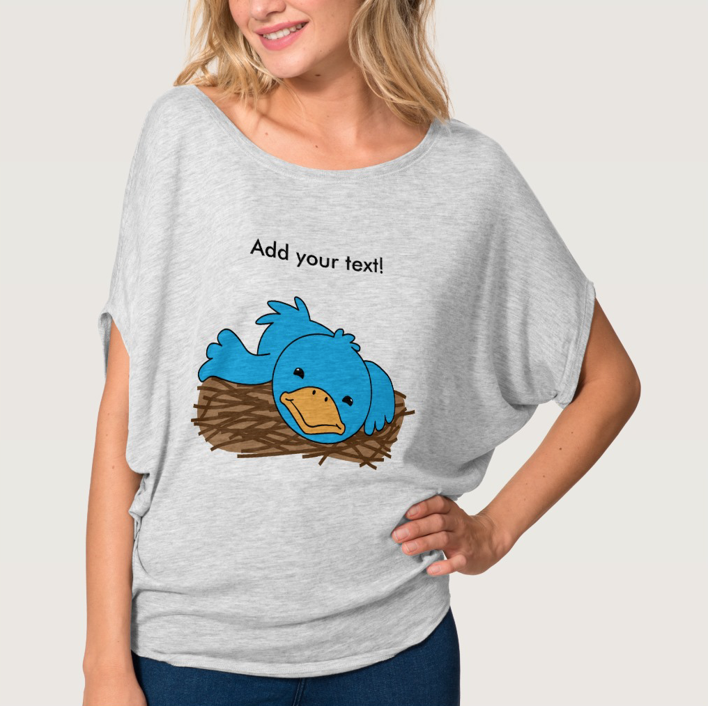 Not So Early Bird sleepy Monday morning blue bird still in the nest because it has no energy to get up for that worm. Funny cartoon image that you can add your text to on Zazzle products like this woman's top.